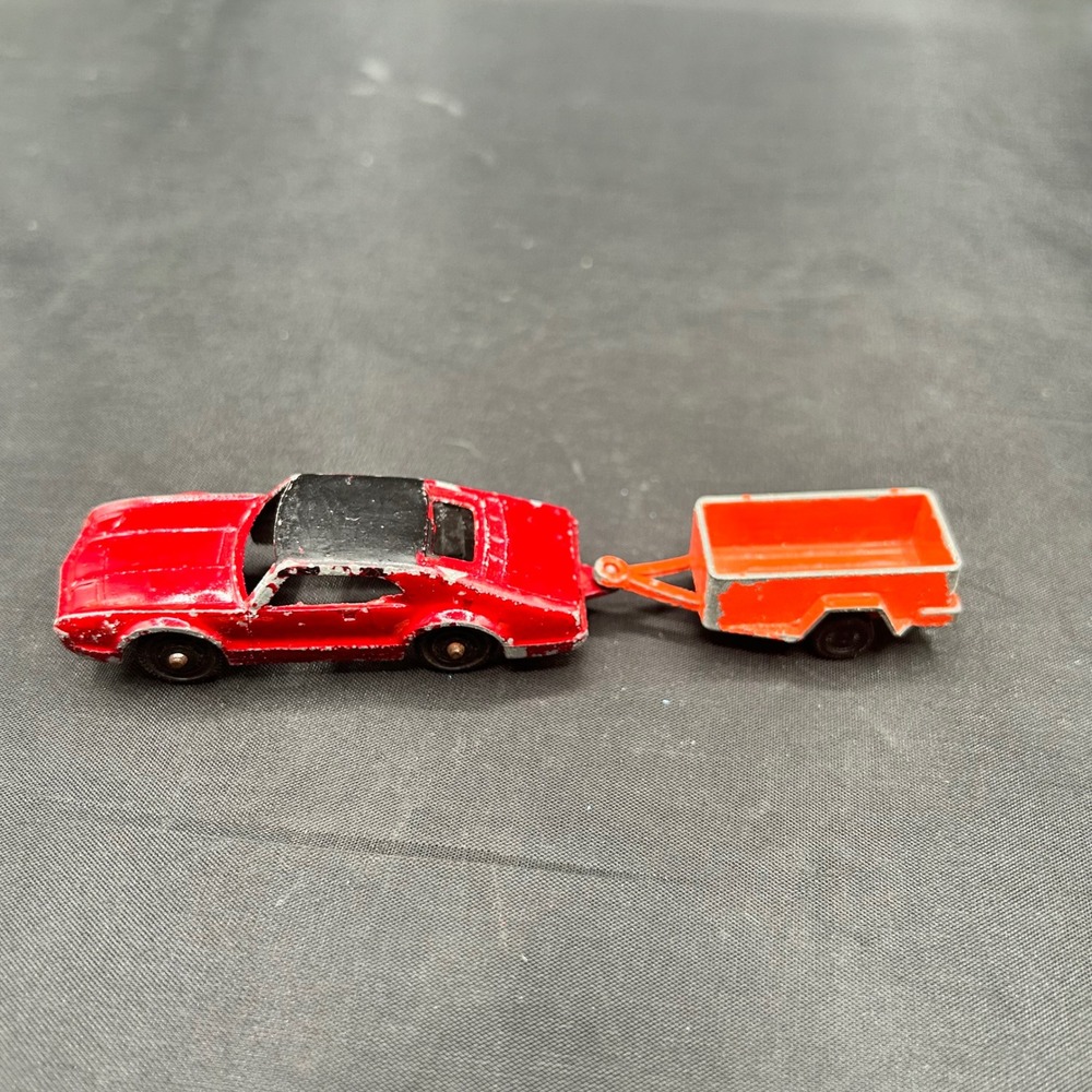 Vintage Tootsietoy Red Oldsmobile Toronado Diecast Car with UHaul Trailer USA